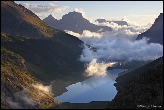 - Gunsight Lake and a Cloud Filled Valley Seen From Gunsight Pass at Sunrise, Glacier NP -