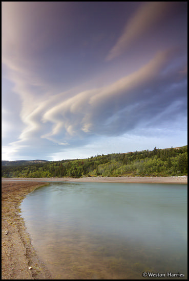 - Unusual Lenticular Cloud Formations Above the Shoreline of Two Medicine Lake at Sunset, Glacier NP -