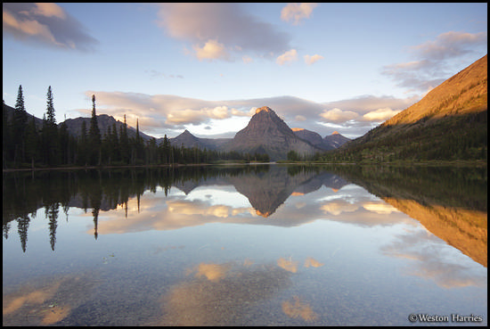 - Painted Teepee Peak, Mt. Sinopah, and Mt. Helen Reflected in Upper Two Medicine Lake at Sunrise, Glacier NP -