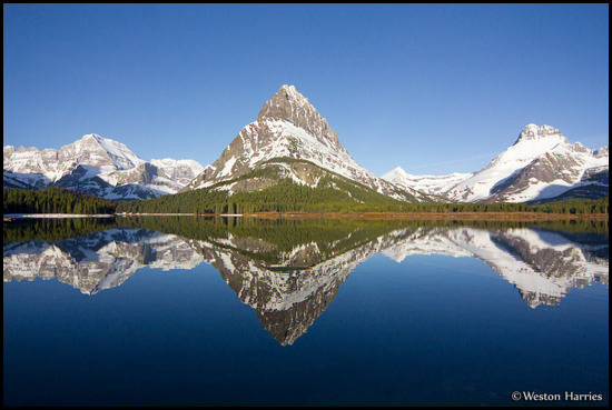 - Mt. Gould, Grinnell Point, and Mt. Wilbur Reflected in Swiftcurrent Lake, Glacier NP -