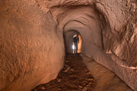 - A Hiker Inside The Tunnel, Arches NP -