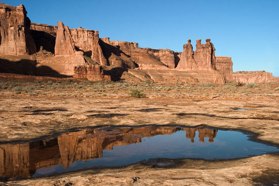 - The Three Gossips Reflected in a Small Pool, Arches NP -