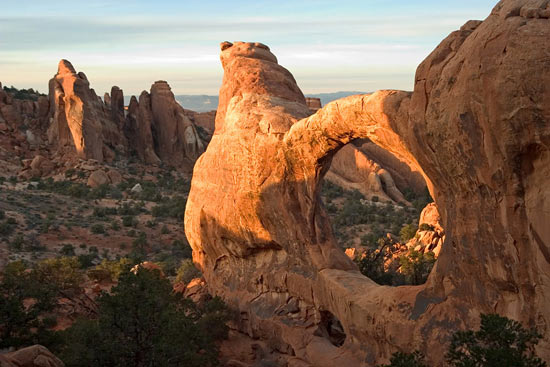 - Sunset Light on Double O Arch, Arches NP -