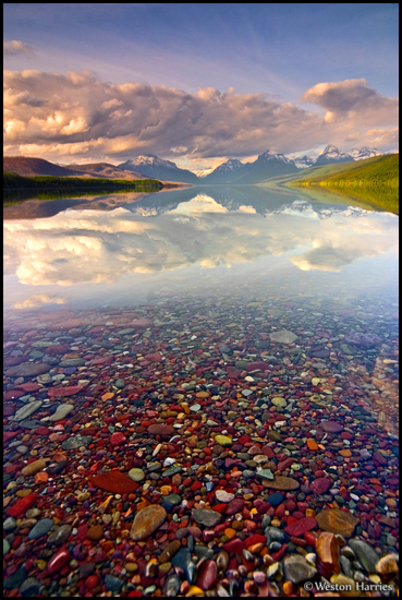 - Colorful Pebbles Below the Surface of Lake
McDonald, with a Reflection of Mtns, Glacier NP -