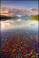 - Colorful Pebbles Below the Surface of Lake
McDonald, with a Reflection of Mtns, Glacier NP -