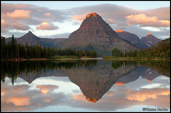 - Painted Teepee Peak, Mt. Sinopah, and Mt. Helen Reflected
in Pray Lake at Sunrise, Glacier NP -