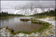 - Unnamed Pond in Preston Park During a Summer Snowfall, Glacier NP -
