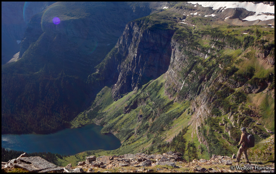 - Backpacker Overlooking Medicine Grizzly Lake, Glacier NP -