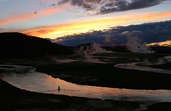 - Fly Fisherman Wading in the Firehole River, Sunset, Yellowstone NP -
